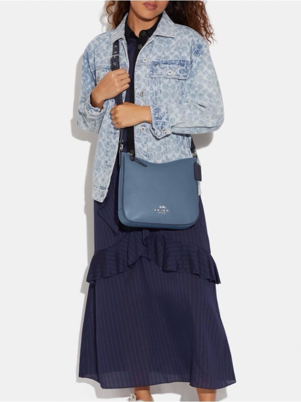 Ellie COACH Pebbled Leather Crossbody Bag in Blue with Logo Strap